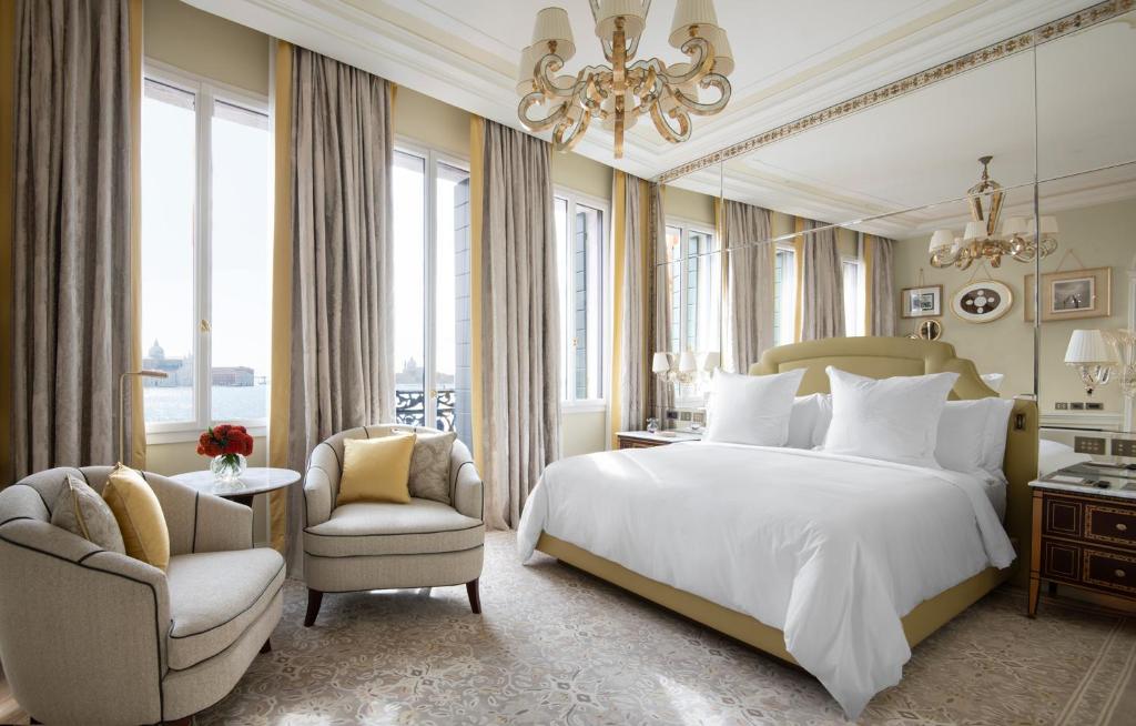 Deluxe room at Hotel Danieli with Venetian terrazzo floor and Murano glass lighting