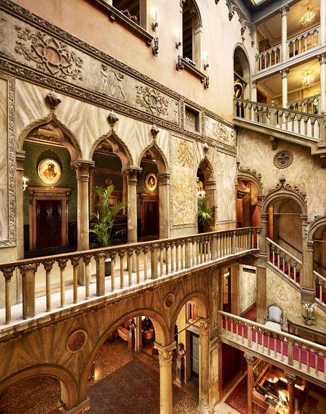 Palazzo Dandolo lobby with pink marble columns and gilded balustrades